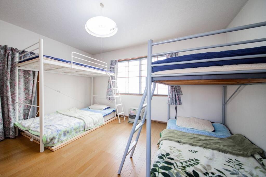 Guesthouse Chiyogaoka Asahikawa Bagian luar foto